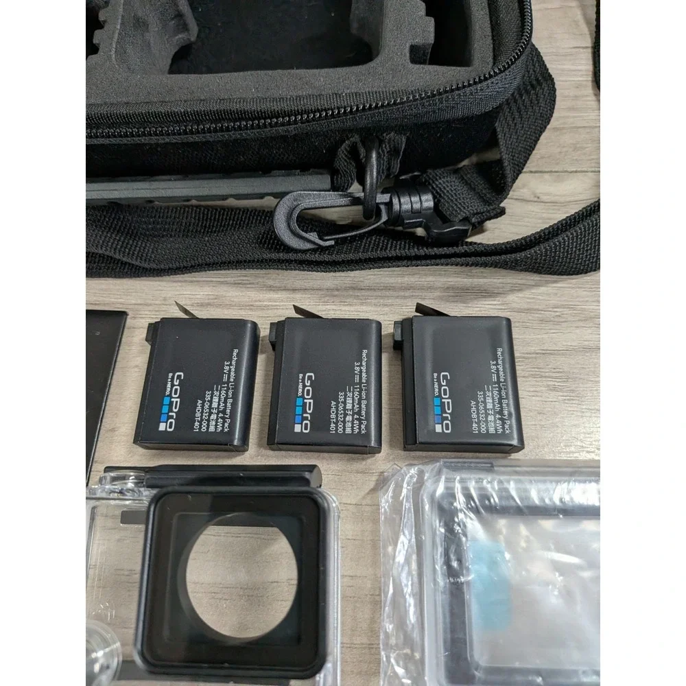 GoPro Hero 4 Silver Edition- with Accessories and Case Included